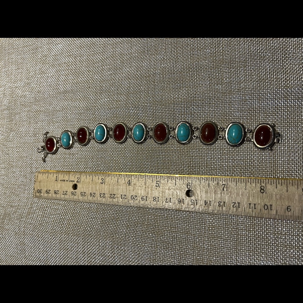 Heavy 925 Sterling turquoise and carnelian stone bracelet.  8”